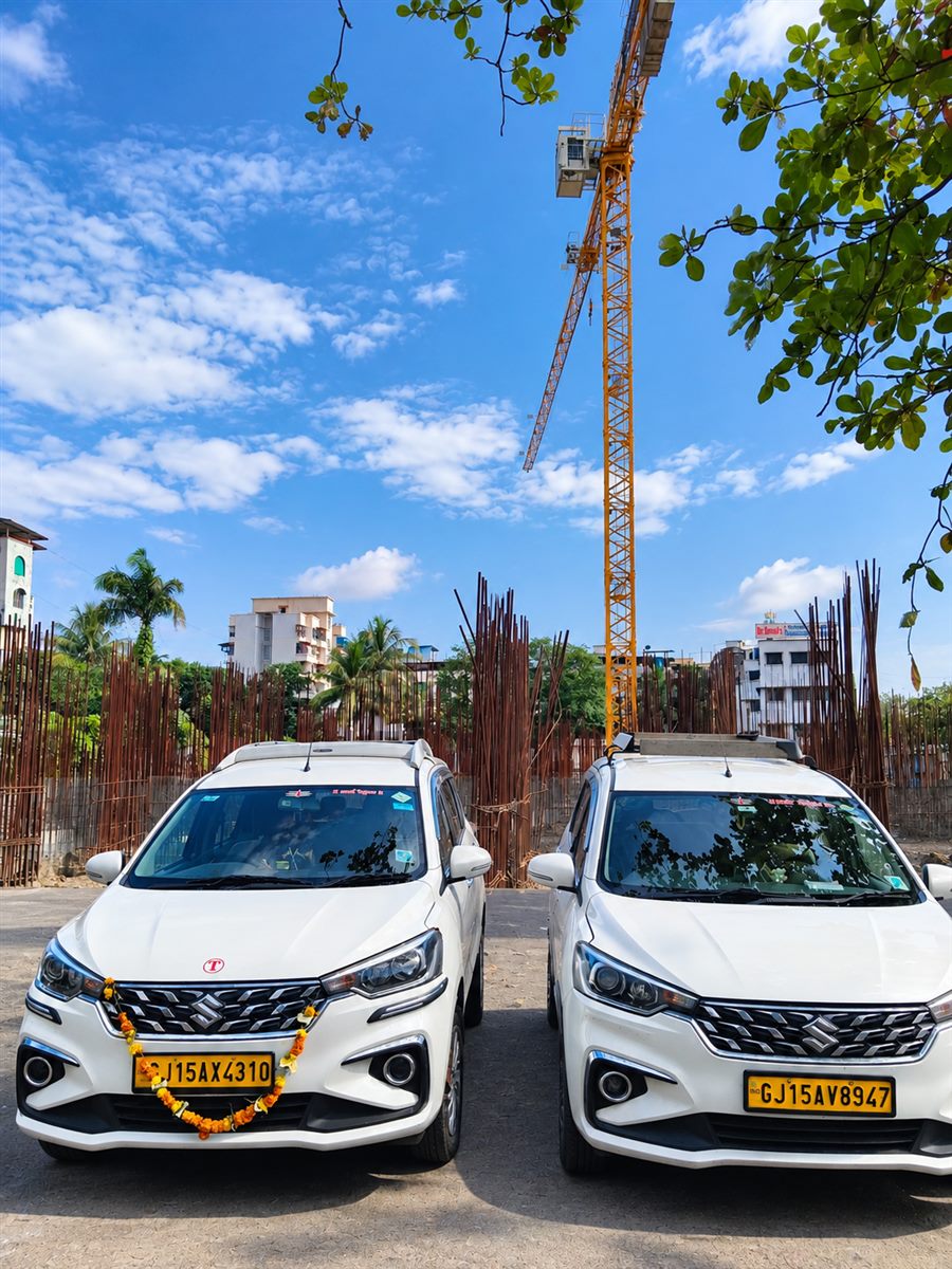 Two Parth Tours Ertiga cabs ready for pick-up